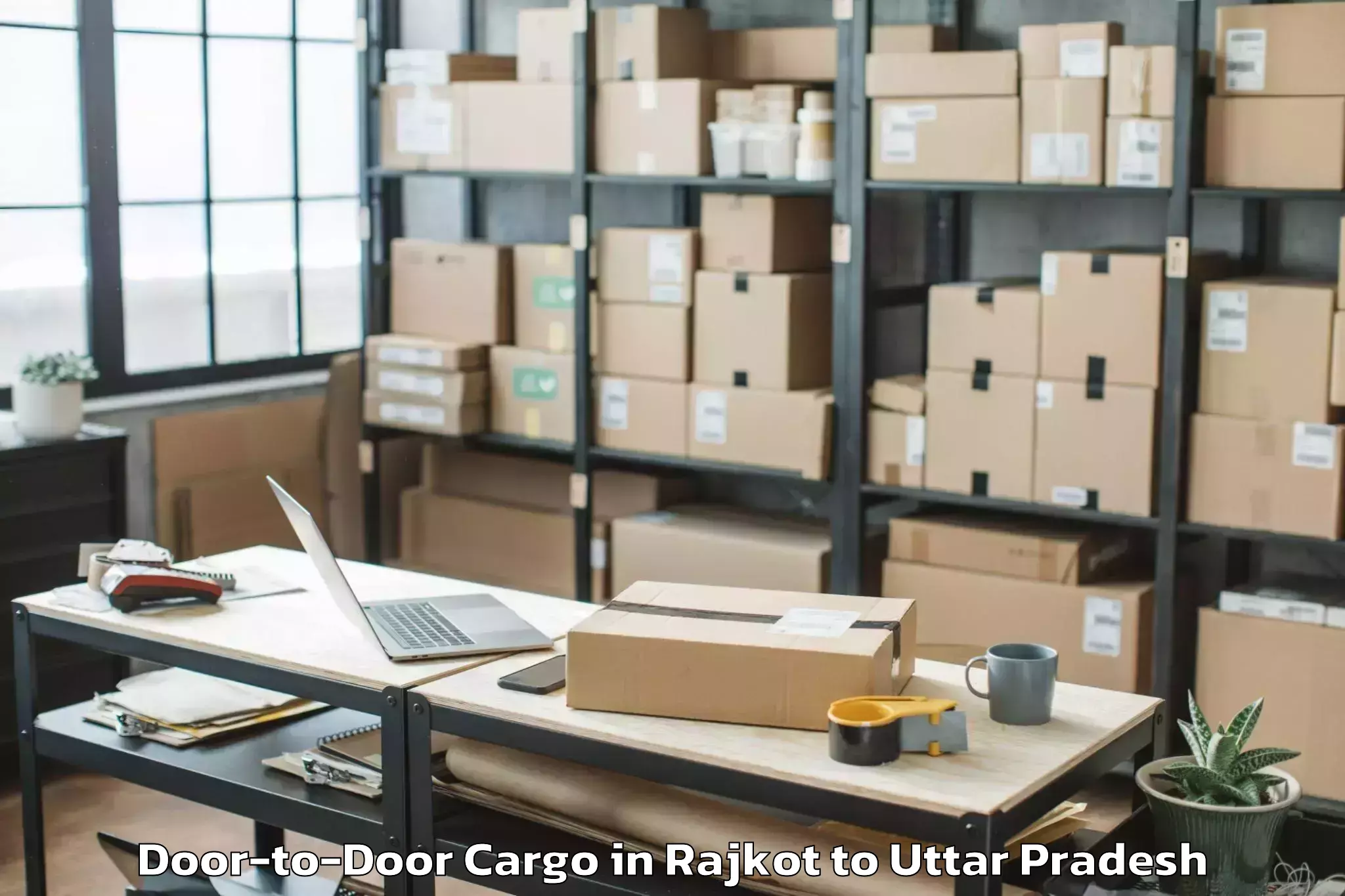 Reliable Rajkot to Usehat Door To Door Cargo